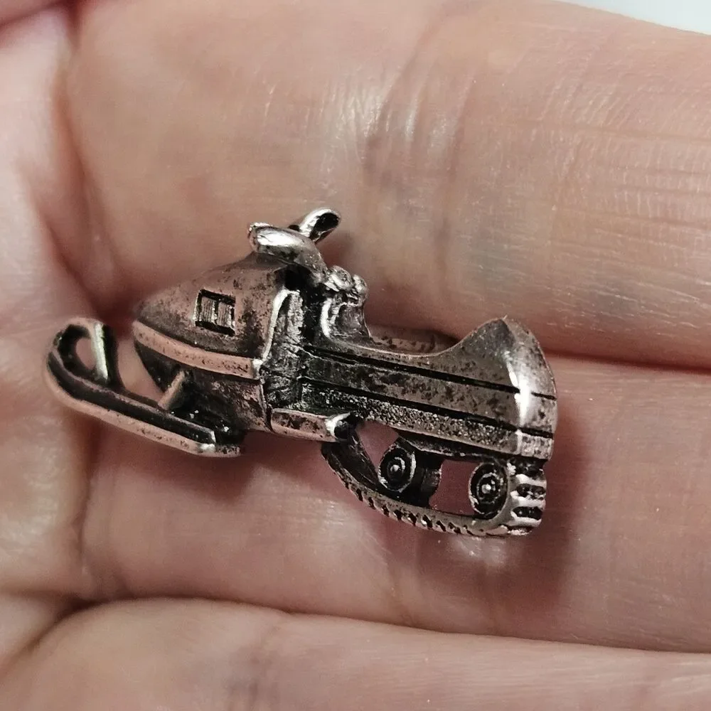 The Mountain Stuff Mark Eliot Schwabe Snowmobile Pin Silver Tone